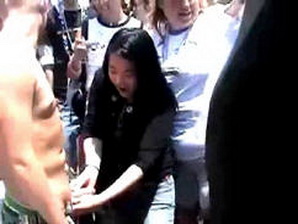 Amateur footage of cockring fitting at a vendor at a street faire in front of a crowd!